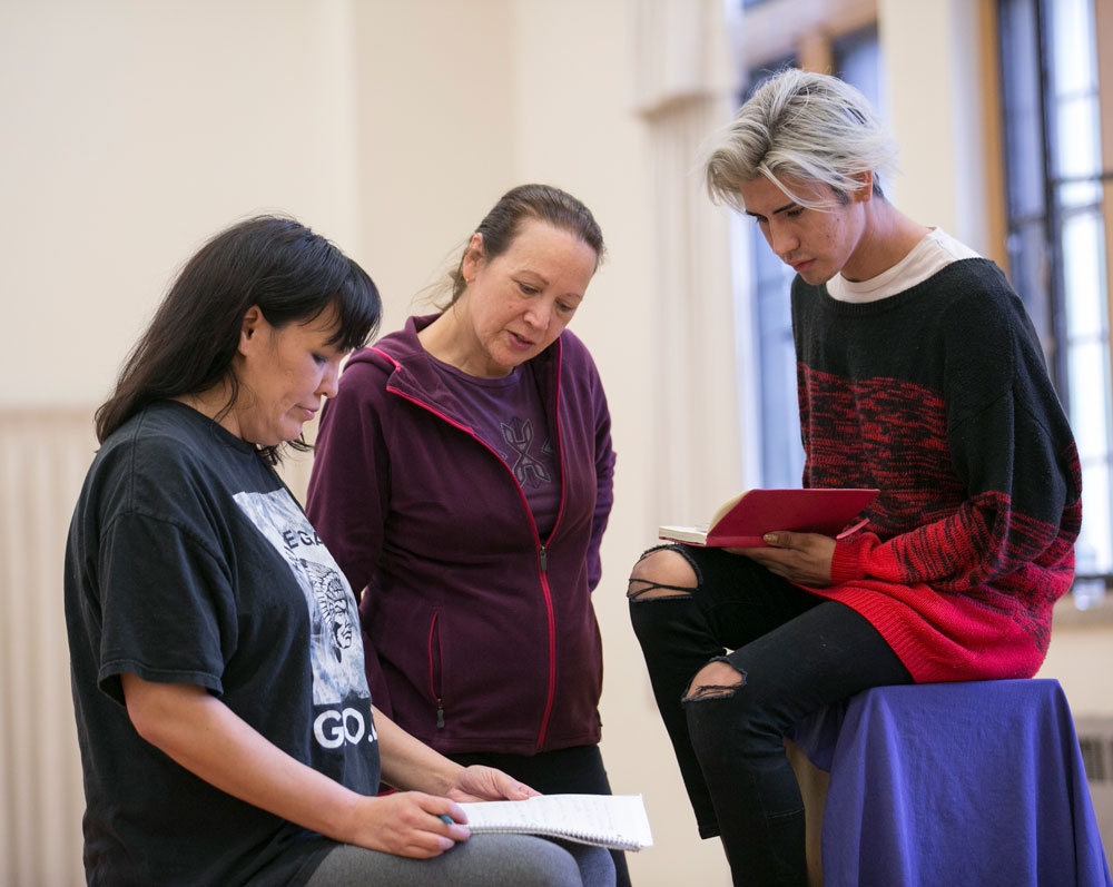 Assistant Professor Carol Greyeyes (centre) speaks with students Wanita Bird and Erryck Stokes in an Aboriginal Theatre Program performance class.