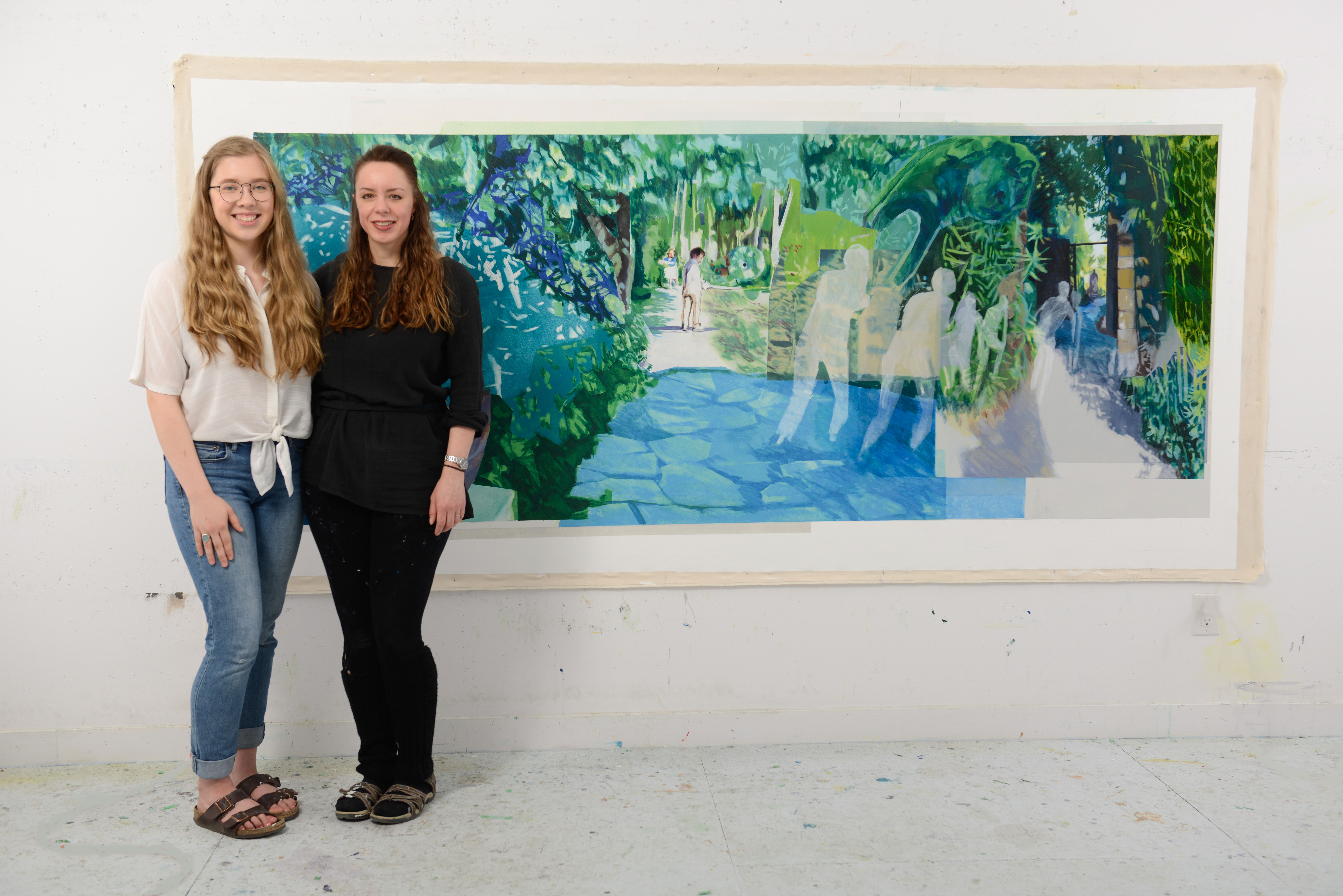 College of Arts and Science student Tia Furstenberg and Department of Art and Art History professor Allyson Glenn stand in front of painting