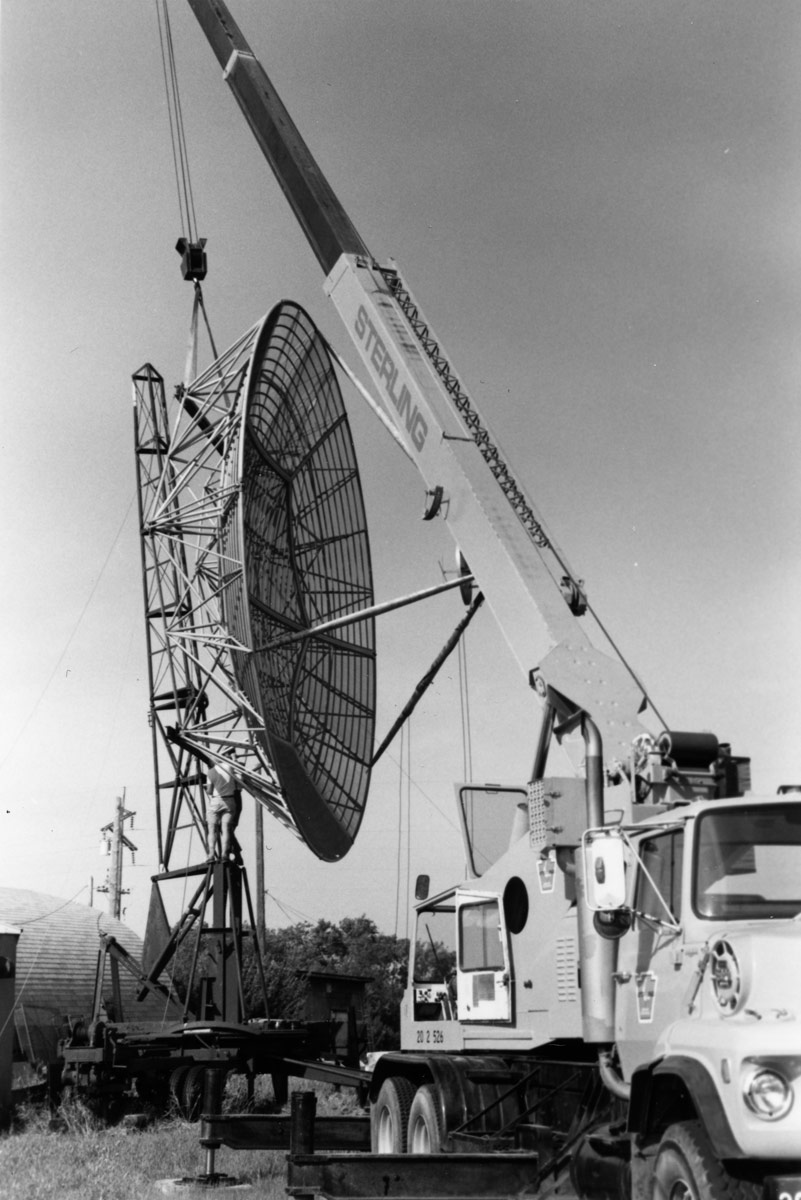 In 1990, the campus radar was disassembled and shipped to the United States. By this time, the original “bedspring” antenna had been replaced with a dish antenna. (Photograph Collection, A-8784)