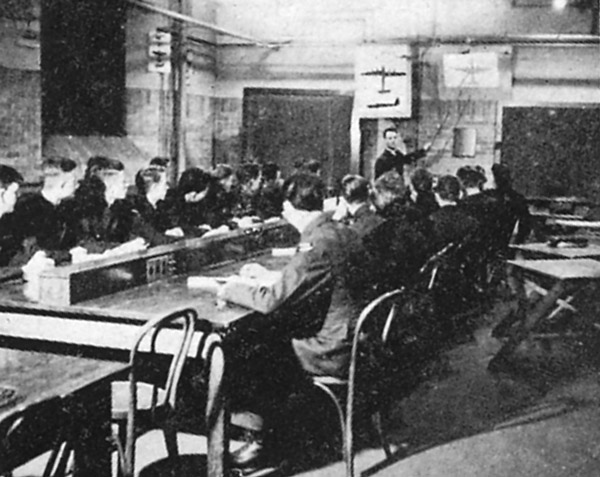 The University Air Training Corps was one of the military training units located on campus during the Second World War. This 1944 yearbook photo shows cadets training in an unspecified classroom. (University Publications, Greystone 1944)