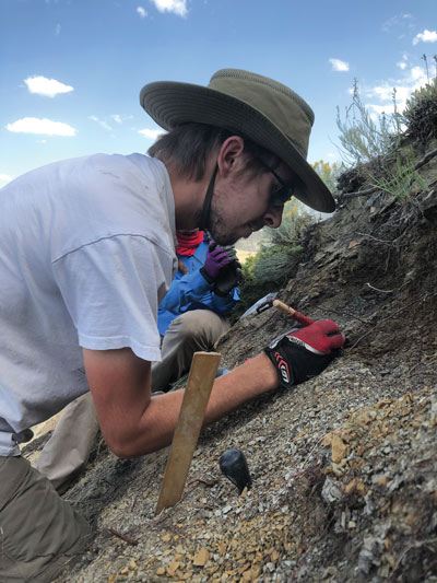 Jack Milligan and Dr. Emily Bamforth carefully uncovered the champsosaur fossils from the rocks. (Photography by Dr. Jordan Mallon)