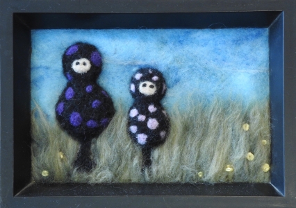 felted figures in felted landscape