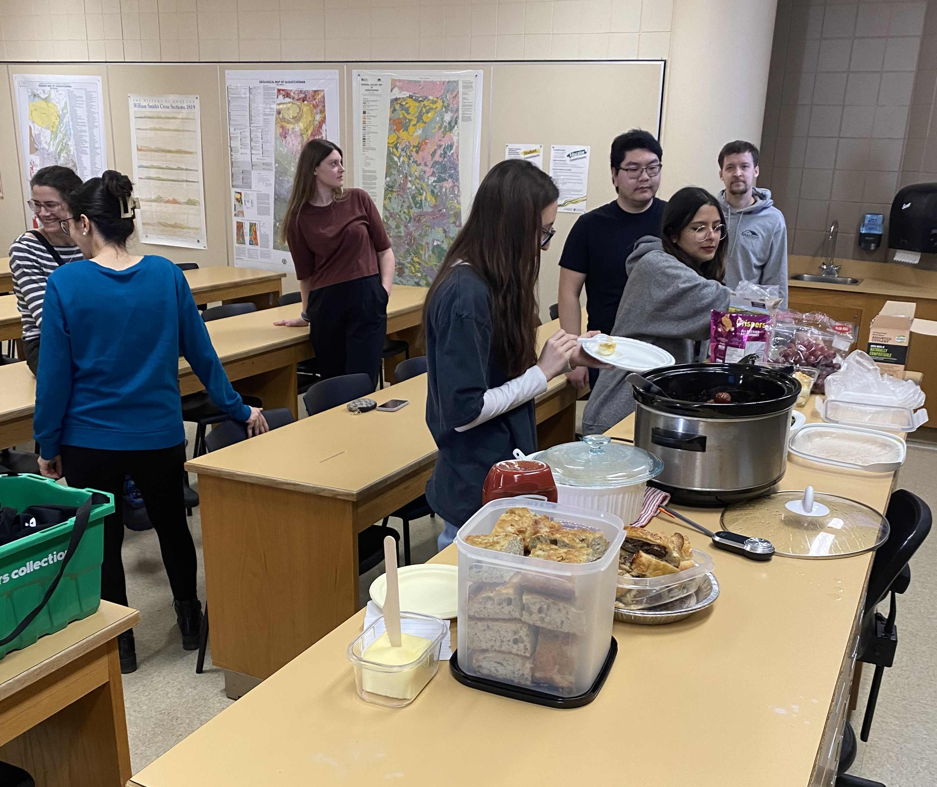students enjoying potluck